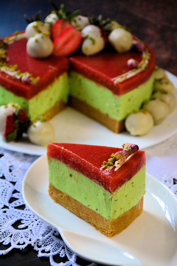 Creamy pistachio cheesecake with strawberry topping